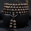 Agarwood Black Qinan High Oil Sinking Bracelet: 108 Bead Buddhist Rosary with Round and Barrel Beads, High-Quality Woody Hand Jewelry.