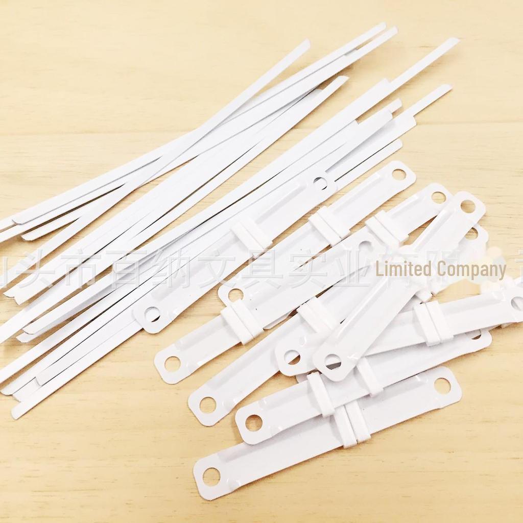 Пластиковые зажимы и двухдырочные переплетные ленты с перфоратором