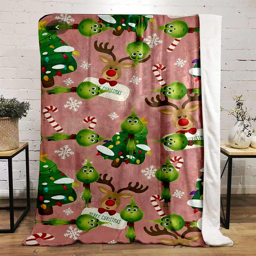 "Grinch & Reindeer Christmas Blanket" Patterned flannel blanket perfect for the bedroom living room, sofa, or a little nap