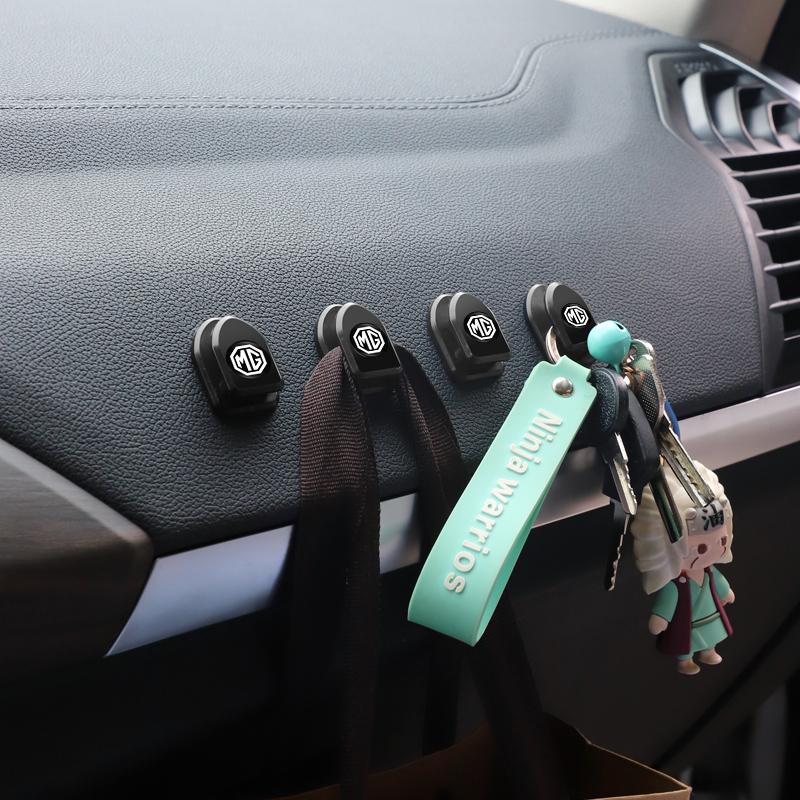 4Pcs Car Mini Storage Hook Auto Emblem Bracket Stickers For MG Cyberster MG3 MG5 MG7 MG6 ZS ES5 ONE HS MG4 EV Cyber X MARVEL R t4