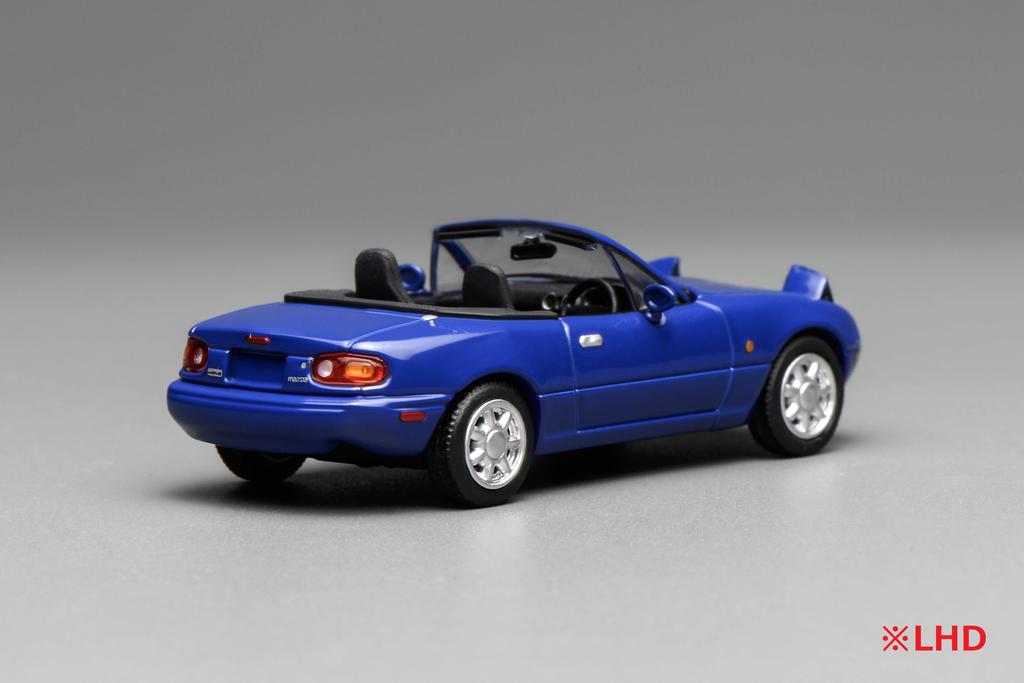Freestyle MOTORHELIX Mazda MX-5 (NA) Miata Drive Laguna Blue Left-Hand Finished Model M60202L 1/64