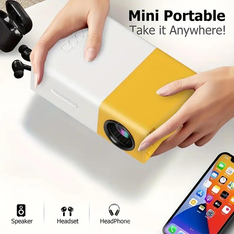 Портативный мини-проектор для домашнего кинотеатра NDUP YG300 — доступная цена со встроенным усилителем звука, стильный дизайн в бело-желтом цвете