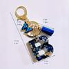 A Personalized Sapphire Blue Outdoor Keychain with a Butterfly Pendant And Tassels Handcrafted Letter Essential for Leisure Travel