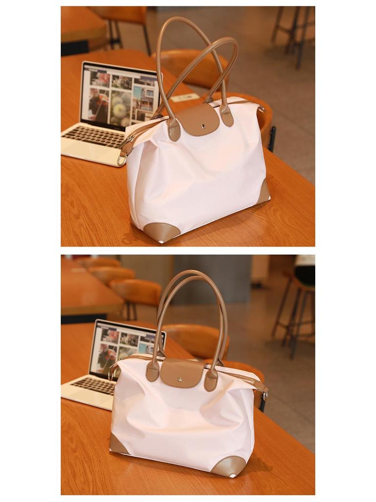 Simple Casual Women's Dumpling Handbag: High-End, Large Capacity, Crossbody & Commute Bag