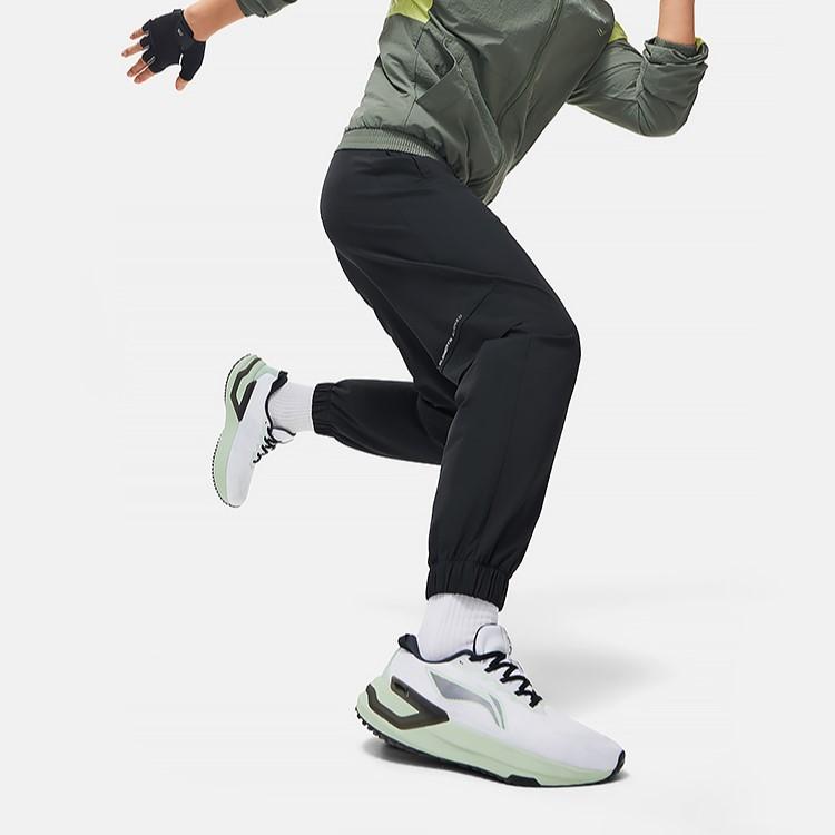 Мужские трикотажные спортивные брюки с манжетами и логотипом Li Ning, черные AYKU061-1