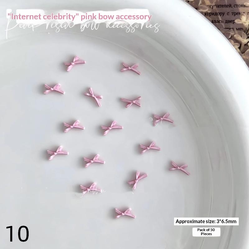 50 шт. Светло-розовые бантики-шармы для ногтей 3D-смола Ленточный бант Декор для маникюра Мини Кавайный галстук-бабочка Принадлежности для маникюра DIY