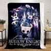 Stylized characters with white masks and dark backgrounds in action poses. for all seasons blanket lunch break throw gift