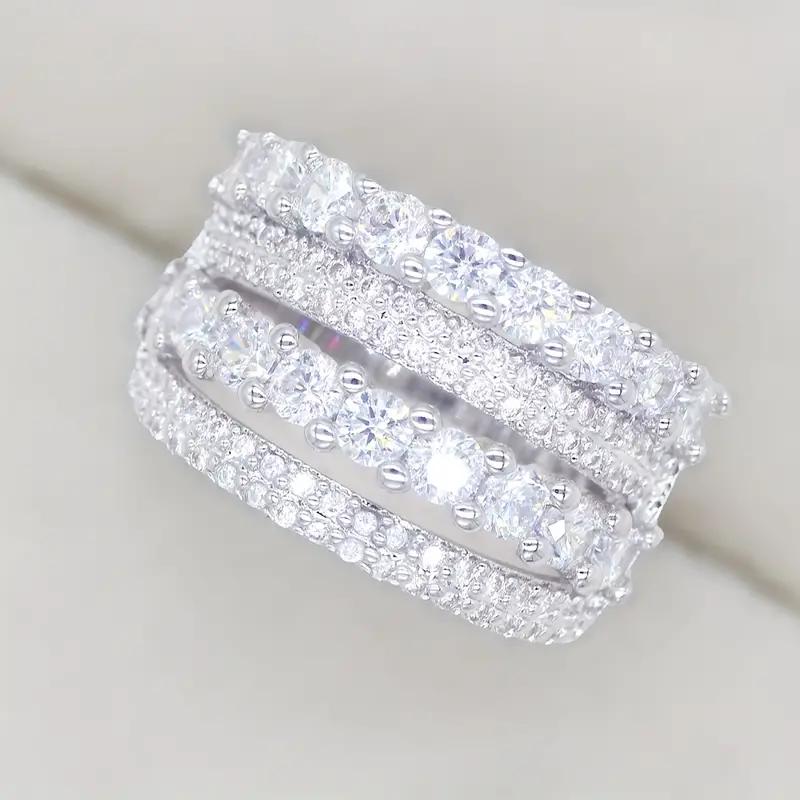 Huitan Модные Роскошные Широкие Кольца Женские Серебряного Цвета Обручальные Кольца Аксессуары Полностью Усыпанные Сверкающим Кубическим Цирконием Изысканные Ювелирные Изделия