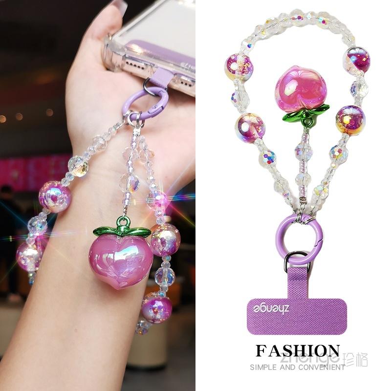 Purple peach pendant, crystal mobile phone lanyard ins women's bracelet, premium wrist pendant, beaded chain short.