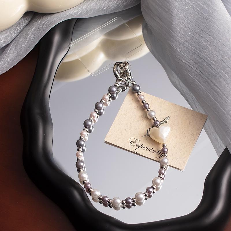 Жемчужный бант на запястье: Стиль Douyin, Защита от потери, Универсальная высококлассная цепочка из бусин для мобильных телефонов