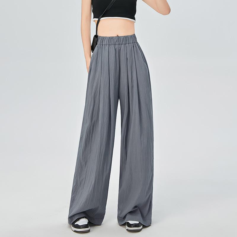 Женские весенние брюки из шёлка с высокой талией и складками — узкие, свободные, широкие с карманами