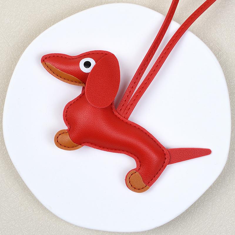 Кожаный брелок-подвеска для сумки в виде щенка таксы и ремешок для телефона