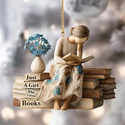 Рождественская елочная игрушка "Просто девушка, которая любит книги" — плоская акриловая фигурка, изображающая чтение.