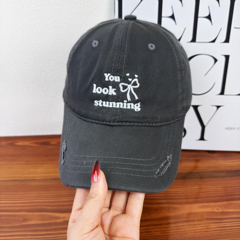 Spring and summer new black baseball hat for men and women Korean hole letter embroidery soft top versatile cap