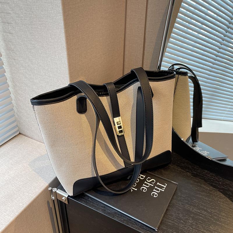 Женская сумка для ручного ношения в дороге 2024 года, новая модная универсальная сумка через плечо большой вместимости, холщовая темпераментная сумка-тоут