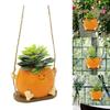 Creative Multifunctional Orange Swing Planter Pot With Swing Feature Suitable for Kids Entertainment and Home Gardening