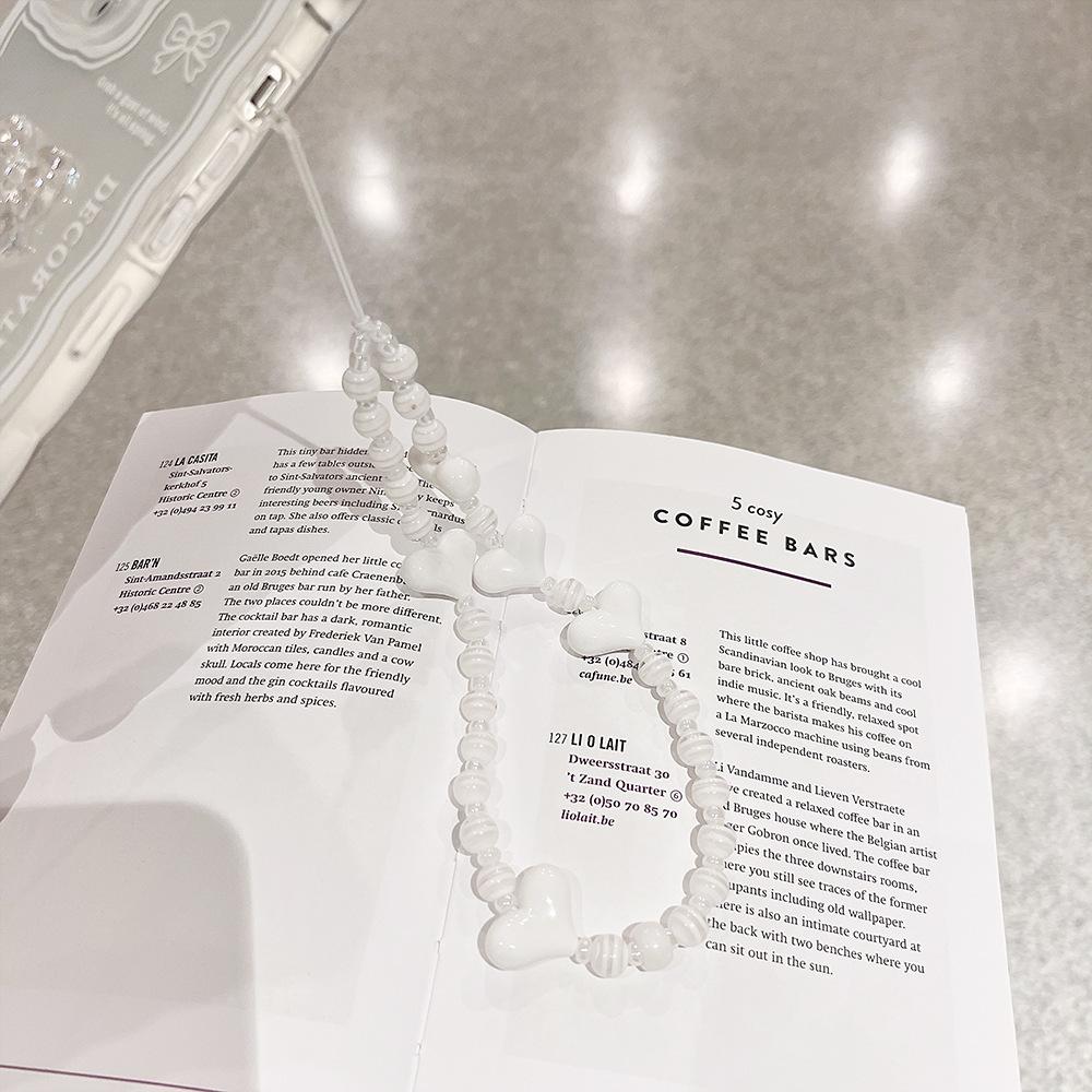 Маленький свежий цвет Любовная цепочка Чехол для мобильного телефона Подвесная цепочка для iPhone14 Женский портативный ремешок на запястье Веревка Ручной