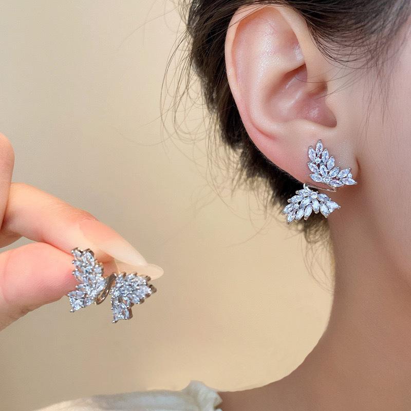 Light luxury zircon butterfly mosquito coil disc ear clips without ear piercings, niche design, high-end unique earrings, women's earrings