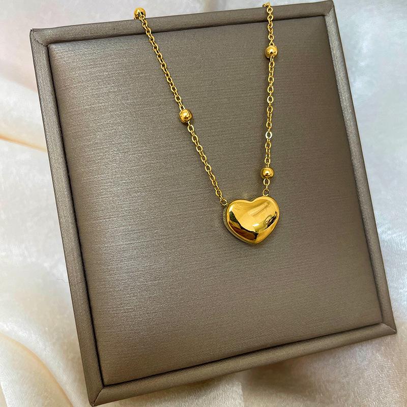 Позолоченная медь 18 карат, цепочка на ключицу с дизайном абака, тыквы-горлянки и лебедя.