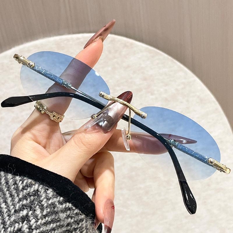 New Fashion Women'S Oval Metal Sunglasses Trendy Frameless Cut Edge Small Circular Eyeglasses Uv Protection Eyewear
