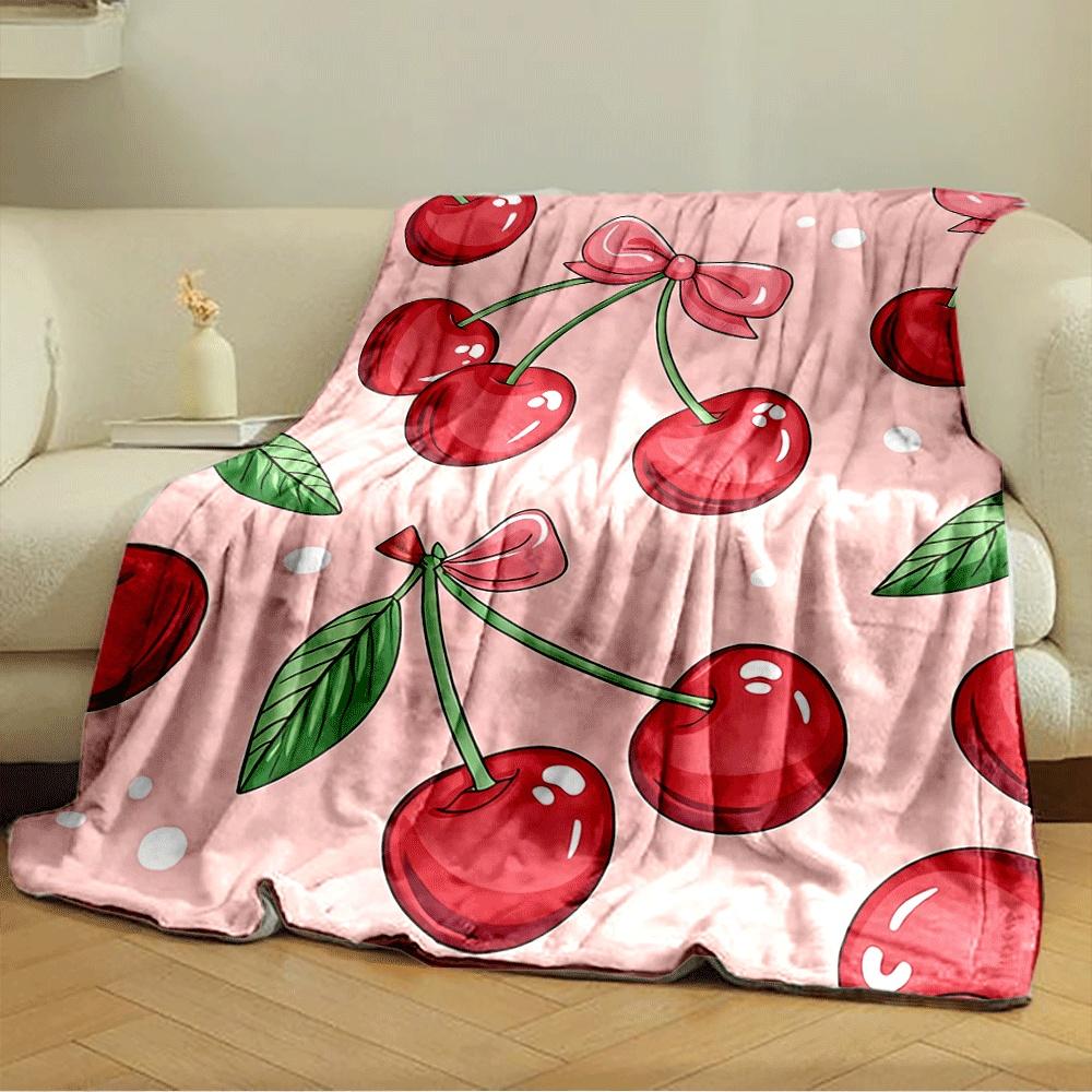 Red cherries with green stems and leaves, pink bows, on soft pink background. for all seasons blanket lunch break throw gift