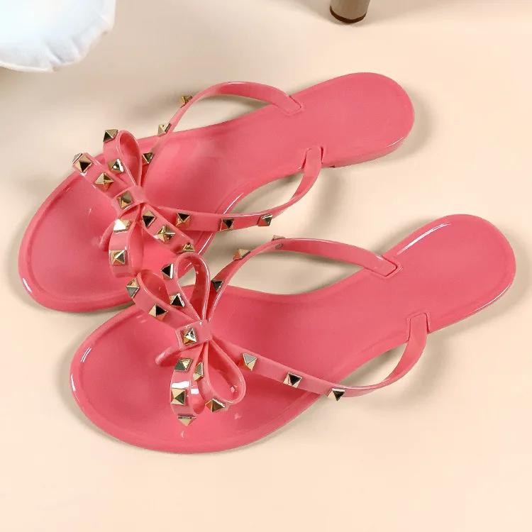 Fashion Woman's Sandals Flats Fashion Woman Flip Flops Summer Slippers Cool Beach Rivets Bowknots Flats Jelly Shoes PVC