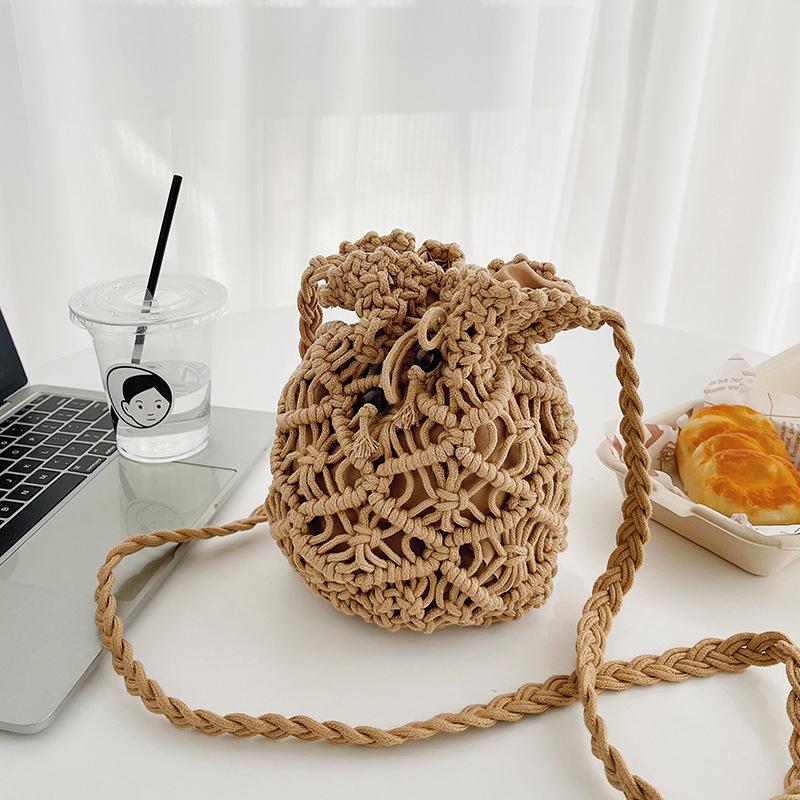Summer New Water Bucket Bag Korean Version Beach Grass Woven Bag Hollow Woven Shoulder Bag Crossbody Bag Small Bag Girl MIT