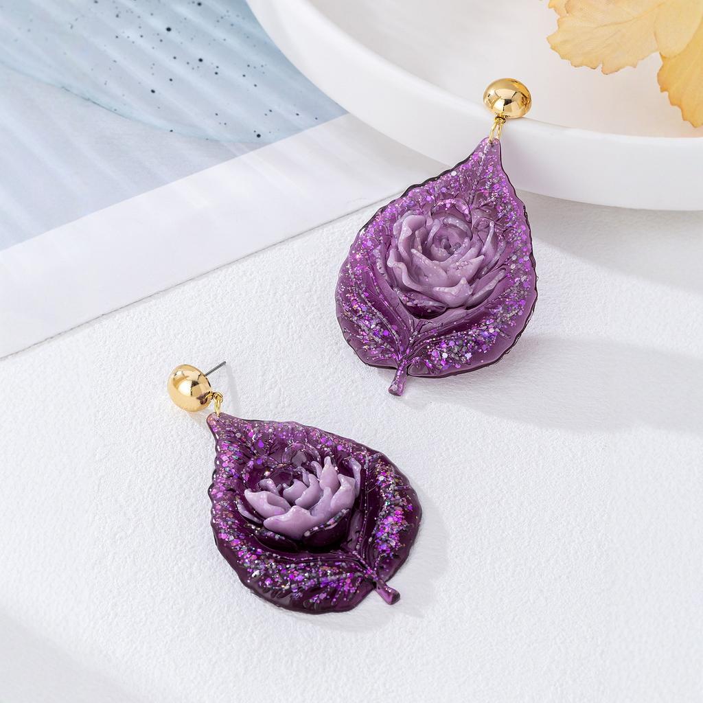 Модные серьги-подвески для женщин