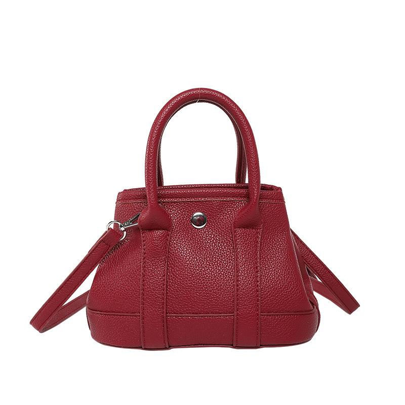 Solid color temperament lychee pattern portable small bag women's versatile senior sense business commuter style messenger bag