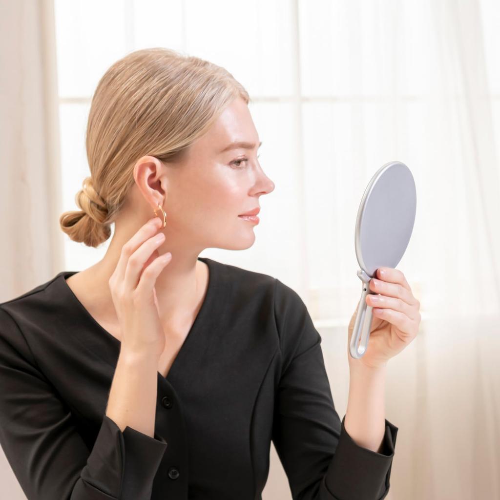 Napure a stand and hand mirror that reflects your true skin in A great Day Mirror, tone, silver. Mother's gift.