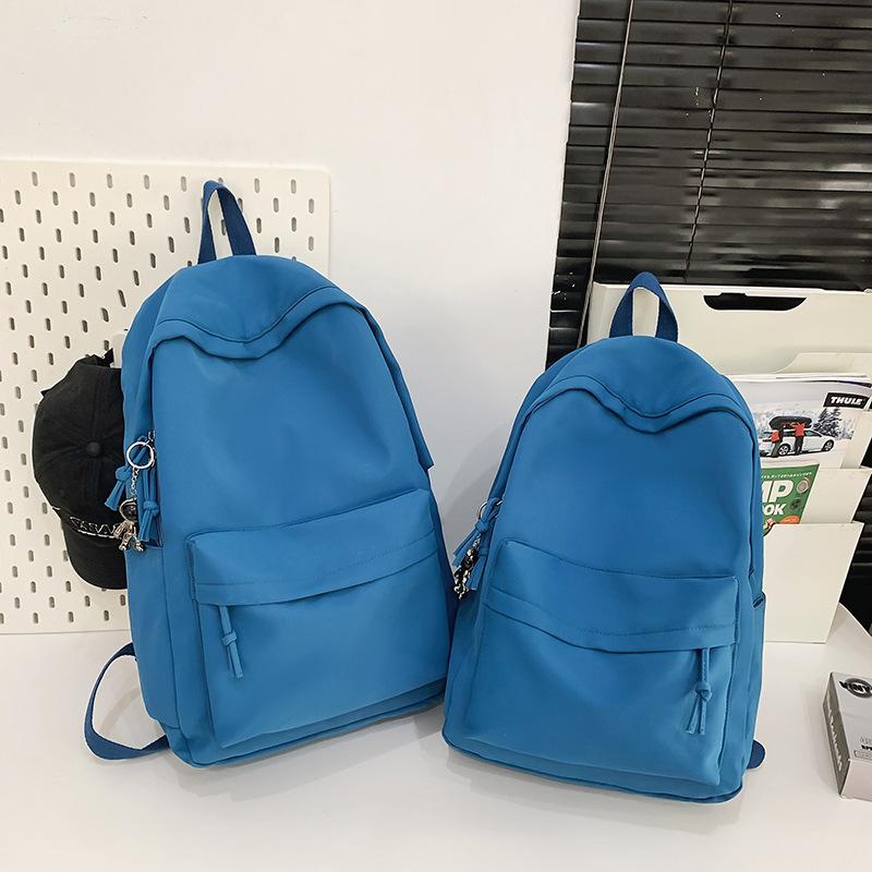 Large Capacity Backpack Male And Female College Students Simple Backpack Solid Color Texture High Value Student Schoolbag