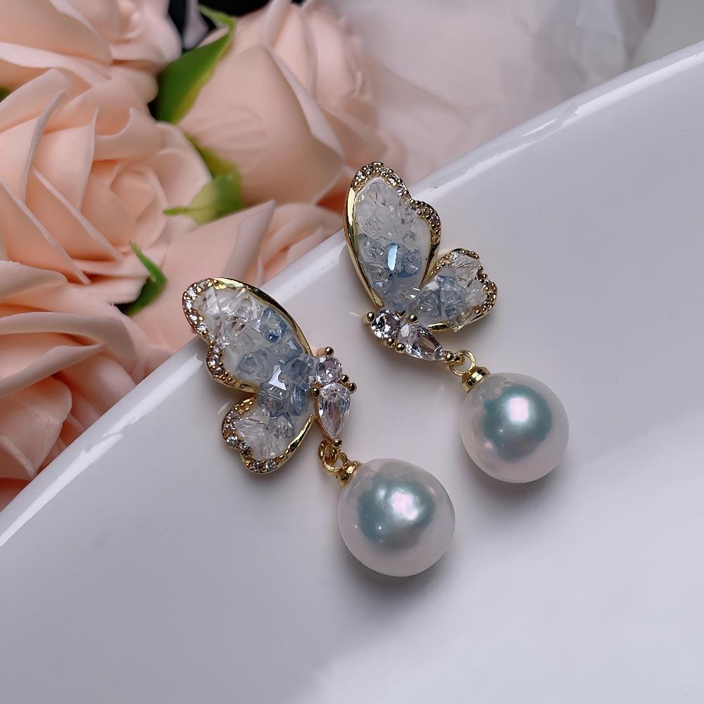 Crystal butterfly earrings, a sophisticated and elegant design, featuring Baroque pearls, with European and American-style silver posts, and a