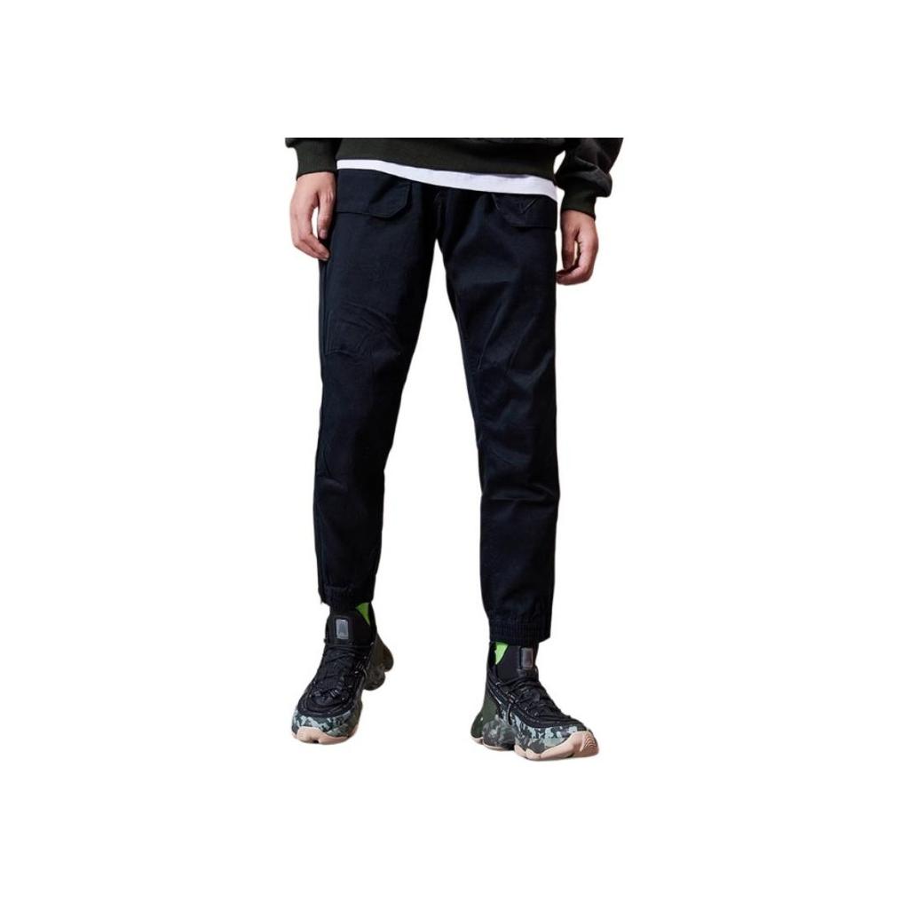 Li Ning Sports Fashion Series однотонные свободные дышащие удобные повседневные брюки мужские брюки черного цвета AKXP049-2