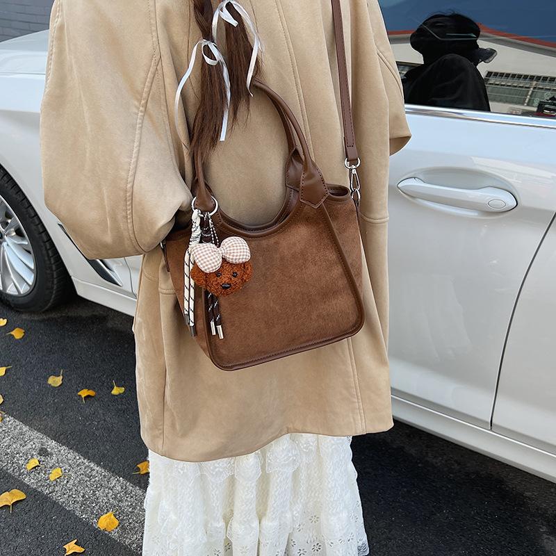 Премиальная нишевая сумка с чувством, женская осенне-зимняя 2025, новая матовая ретро сумка через плечо, популярная портативная сумка-ведро