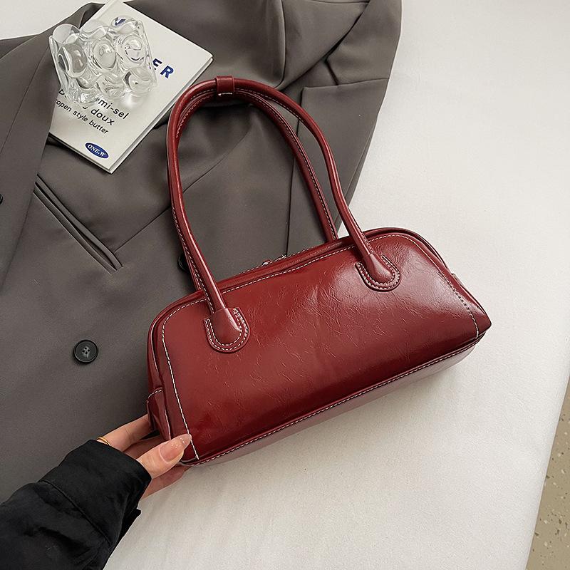 Простая сумка интернет-знаменитости 2025 новая модная осенне-зимняя на плечо женская сумка с высоким чувством подмышечная универсальная сумка-бостон тренд