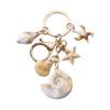 Изысканный брелок в виде ракушки, морской звезды и подвески в виде звезды. Модный аксессуар для пляжного отдыха.