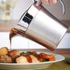 Elegant Double-insulated Stainless Steel Gravy Boat with a Hinged Lid - Perfectly Suitable for Pouring Juices and Creams