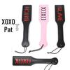 XOXO BDSM Hand Paddle: Erotic Training Tool for Couples' Foreplay and Punishment.