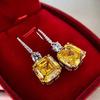 Серьги Huajie Yellow Diamond Ice Flower: Элегантный европейский и американский стиль с универсальной инкрустацией цирконием.