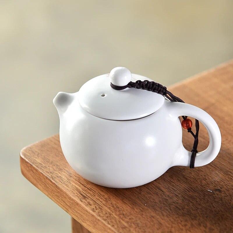 Чайники с кракелюром цвета селадона, традиционный чайный сервиз, черный чайник для улуна, керамический чайник, посуда для напитков с цветущим цветком