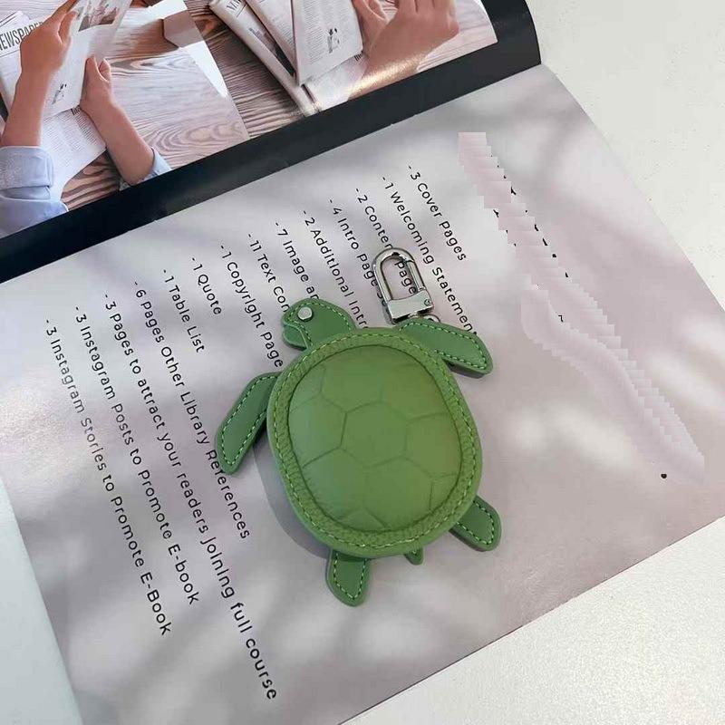 2025 Новый кожаный кулон Head Layer кожаный мини-кошелек для наушников Черепаха кулон Cross Border