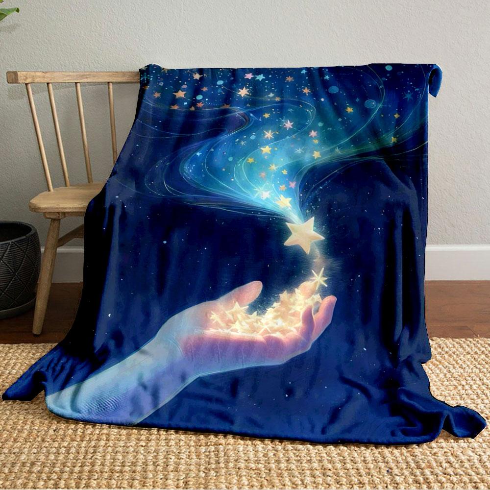 A glowing hand releases radiant stars into a swirling, cosmic night sky. for all seasons blanket lunch break throw gift