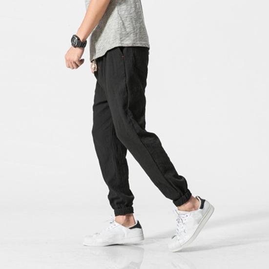 Весна Осень Мужские шаровары Шаровары Свободные завязывающиеся на шнурок эластичные карманы Глубокий шаговый шов с резинкой на щиколотке Однотонные спортивные брюки Повседневная одежда Спортивные брюки