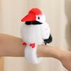 Cute parrot plush wristband with snap closure. Colorful bird-shaped wearable toy for kids, lovely collectible accessory.