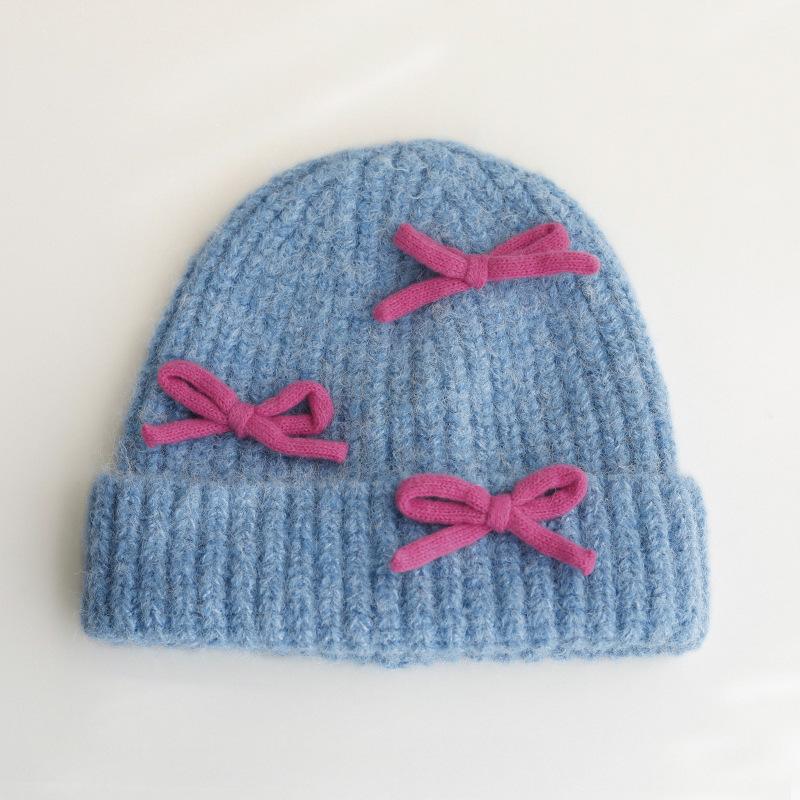 Вязаная шерстяная шапка с бантом для женщин на осень и зиму, теплая и универсальная, утолщенная защита ушей, шапка, подчеркивающая маленькое лицо
