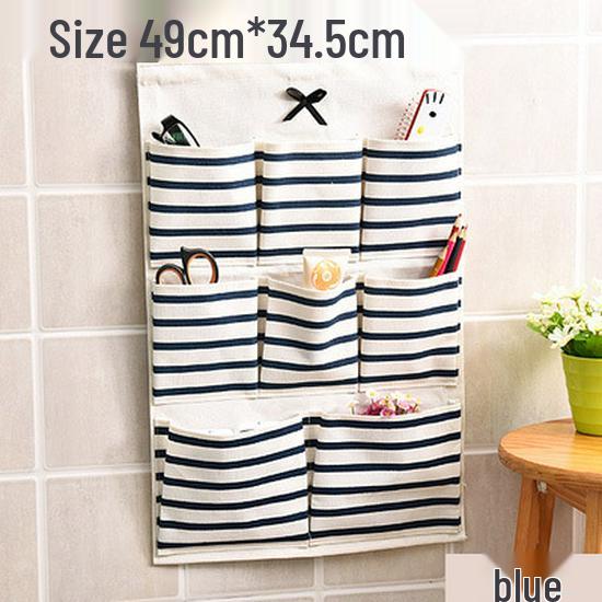 Полосатая настенная подвесная сумка для хранения из хлопка и льна с бантом и множеством карманов для кухни или ванной комнаты.