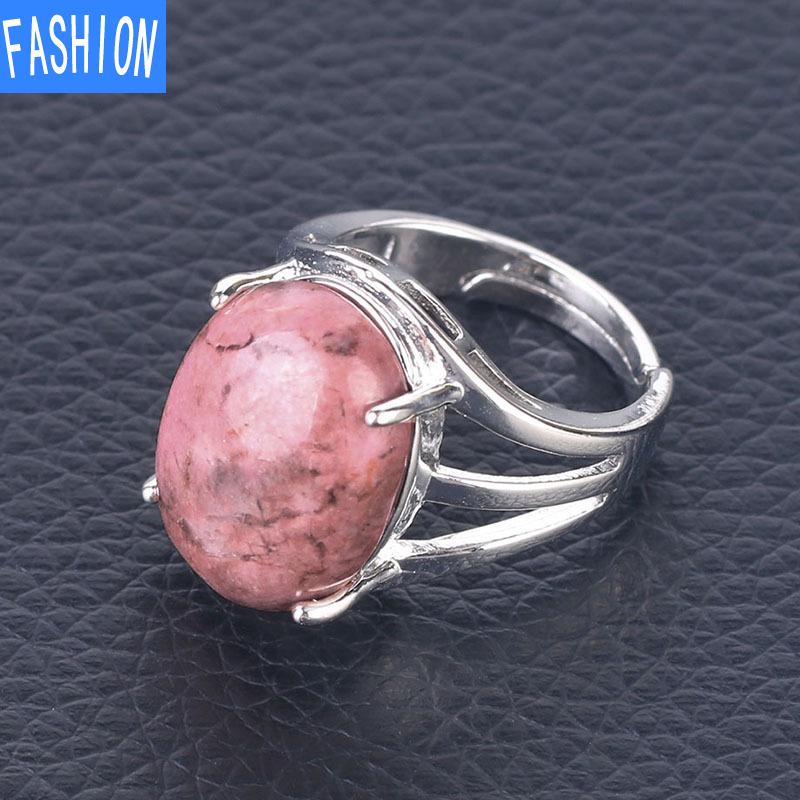 Oval Natural Crystal Four-claw Inlaid Hollow Ring