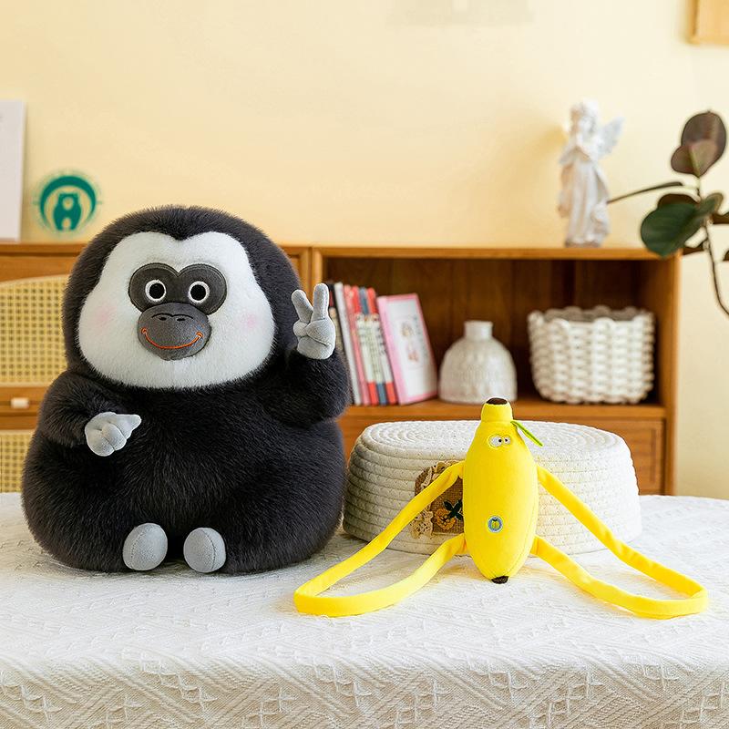 Internet celebrity white-faced monk monkey plush doll banana backpack white-faced monkey holding lotus doll birthday gift