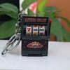 Мини-игровой автомат Брелок-игрушка Портативная ручная игра в казино Брелок с функциональным рычагом для розыгрыша призов и развлечений