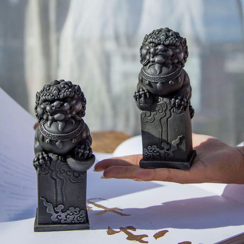 Chinese Cast Iron Stone Lion Desktop Ornament: Cultural Craft for Wealth and Protection.